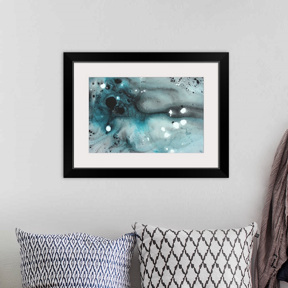 A bohemian room featuring Contemporary abstract painting of muted watercolor background with dark ink splatters.
