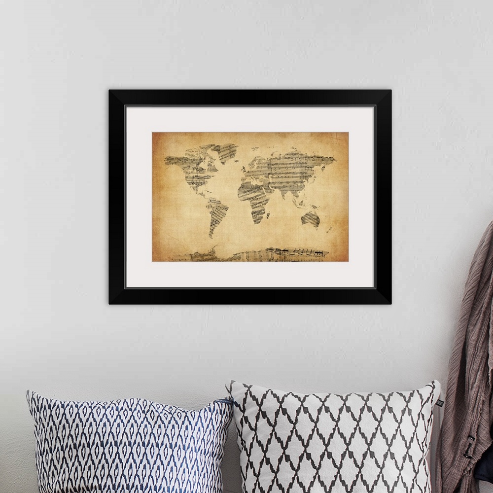 A bohemian room featuring Contemporary artwork of a world map made from musical notation against a distressed background.