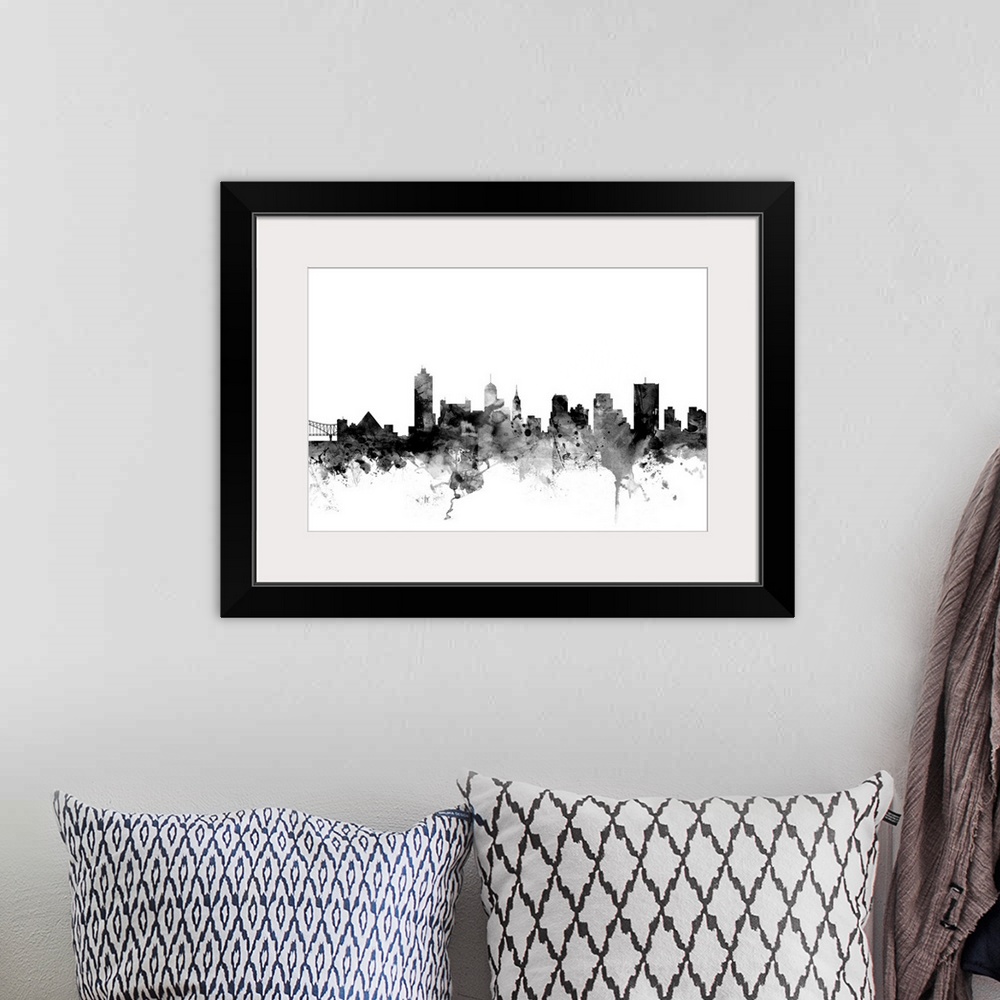 A bohemian room featuring Smokey dark watercolor silhouette of the Memphis city skyline.