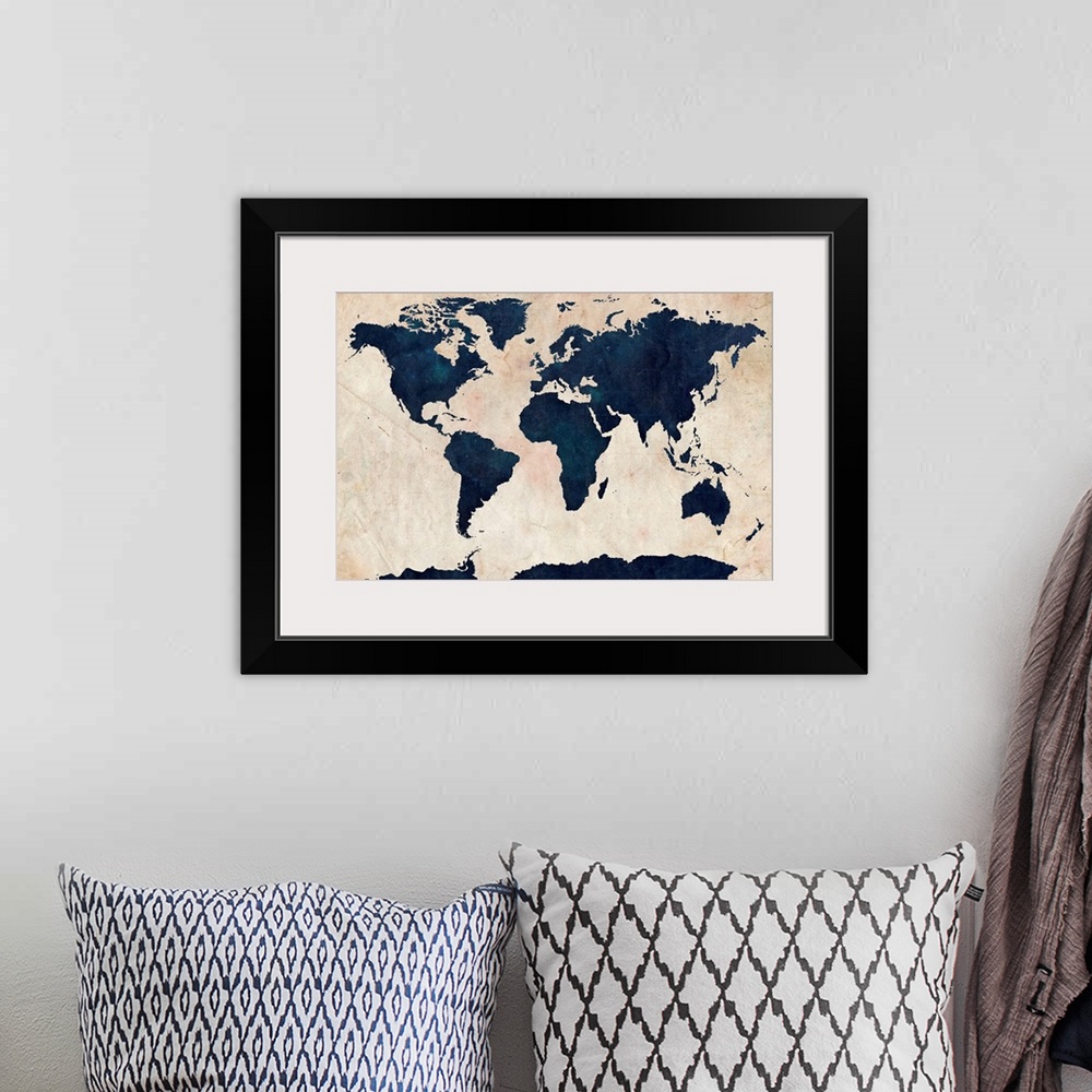 A bohemian room featuring Big canvas art of distressed stenciled map of the world with the continents silhouetted.