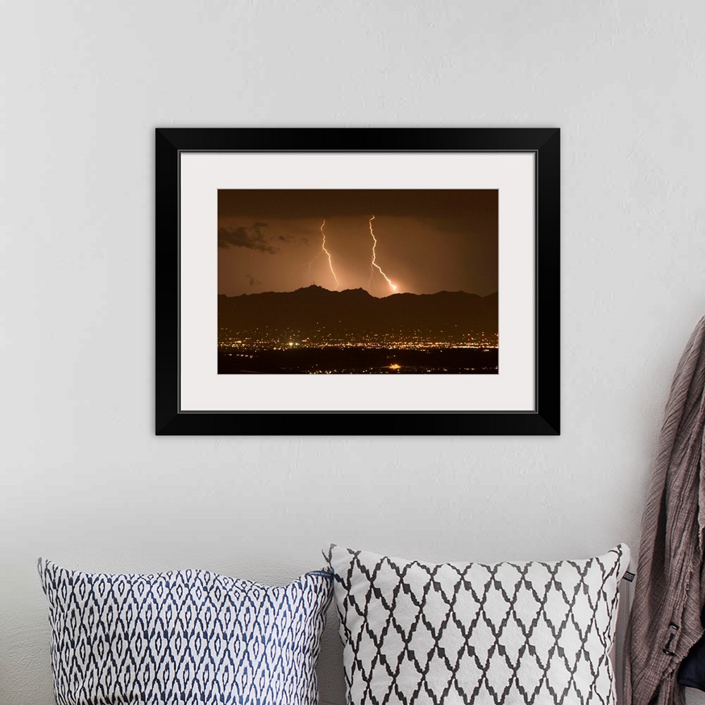 A bohemian room featuring Lightning bolt strikes out of a typical monsoonal lightning storm.