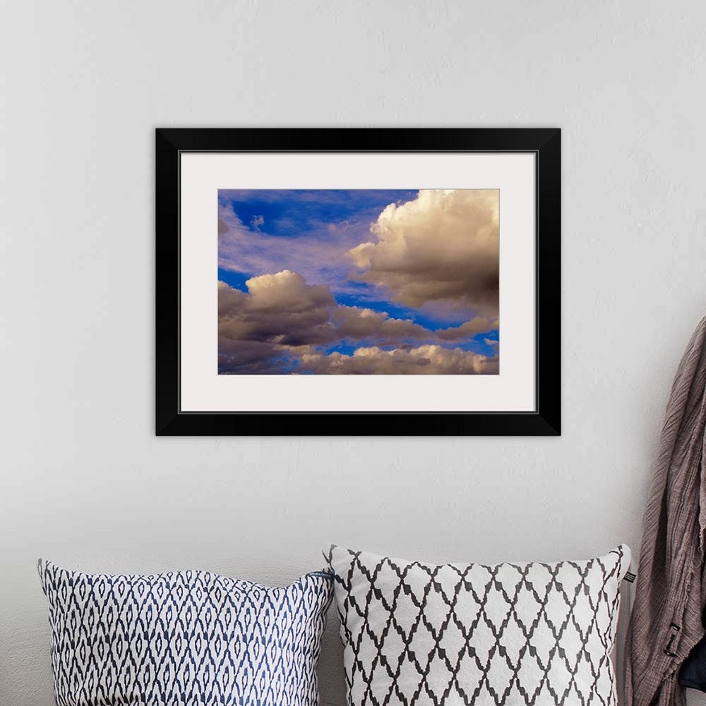A bohemian room featuring Colorful clouds against blue sky, New Mexico