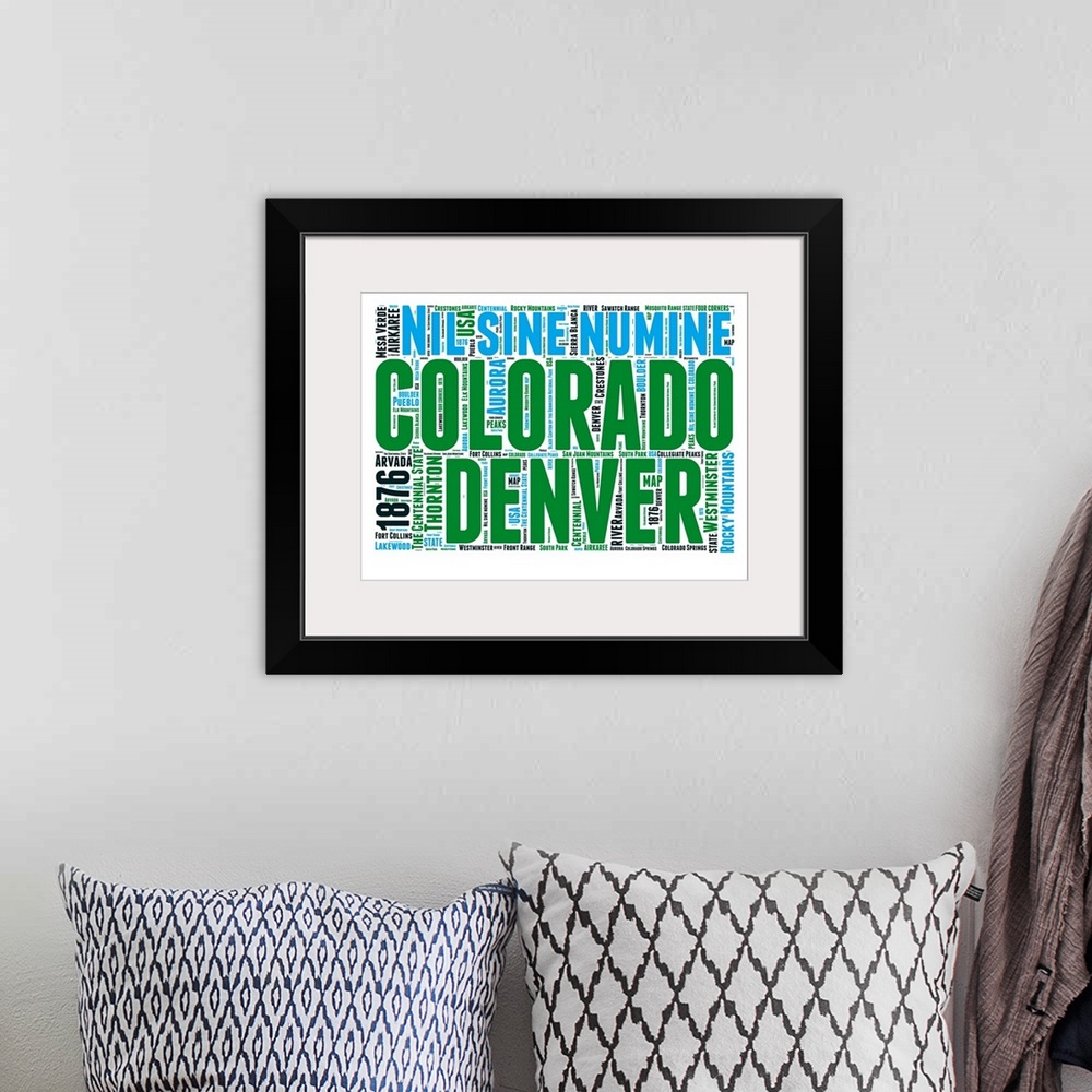 A bohemian room featuring Typography art map of the US state Colorado.