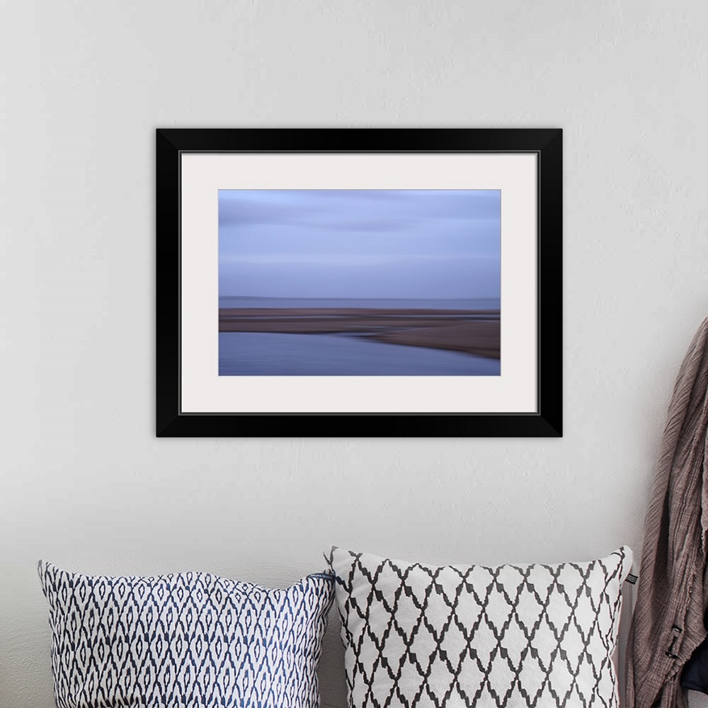 A bohemian room featuring Artistically blurred photo. Winter view on the lake Flade So in Denmark, late in the afternoon af...