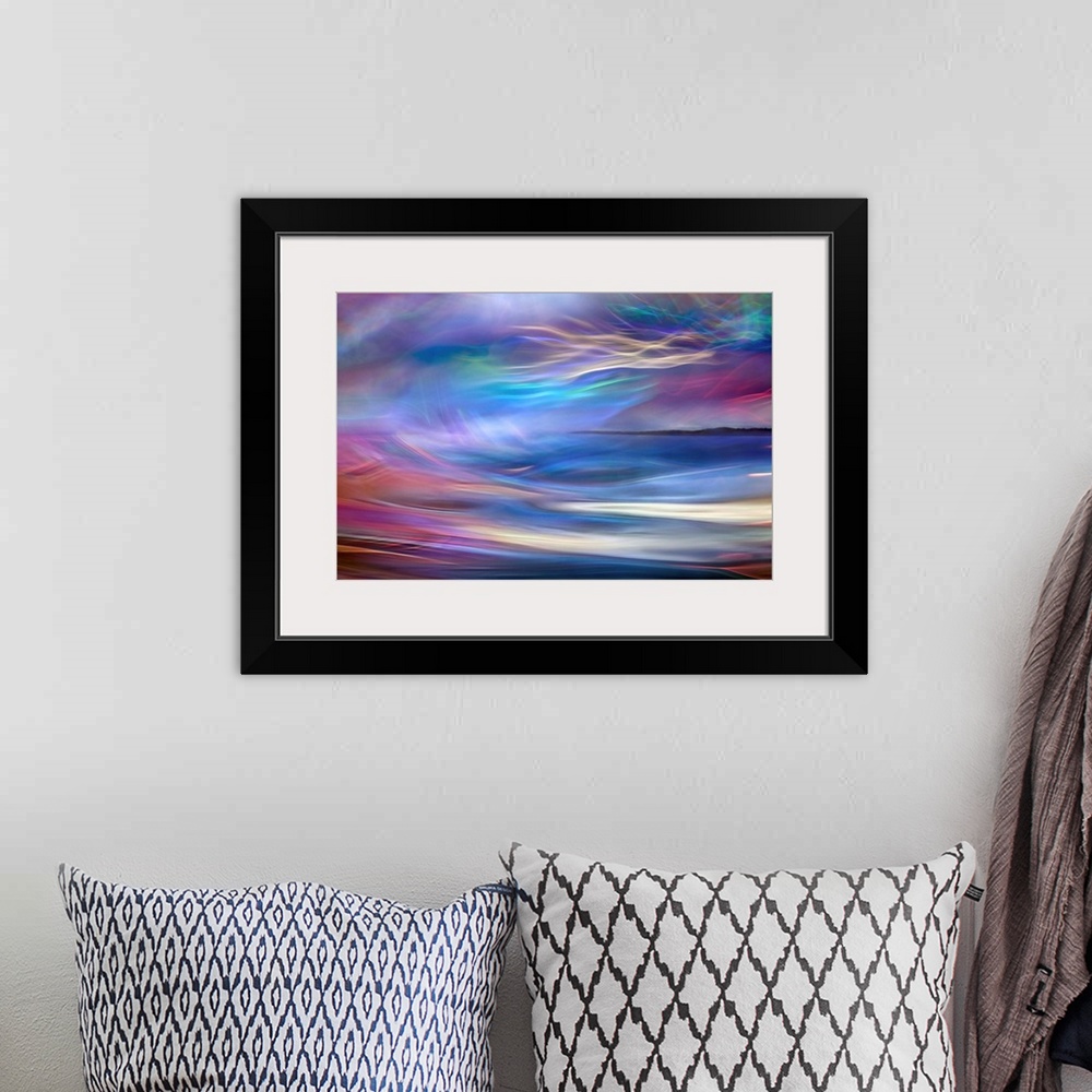 A bohemian room featuring Abstract photograph using time lapsed photography techniques creating indistinct light trails ble...