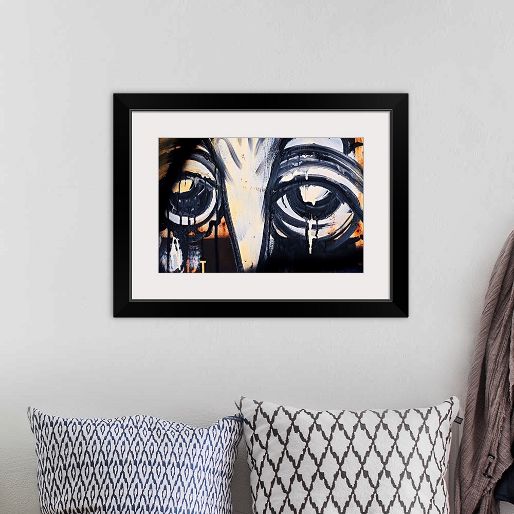 A bohemian room featuring Eyes