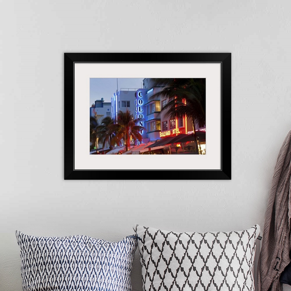 A bohemian room featuring Hotels lit up at dusk in a city, Miami, Miami-Dade County, Florida