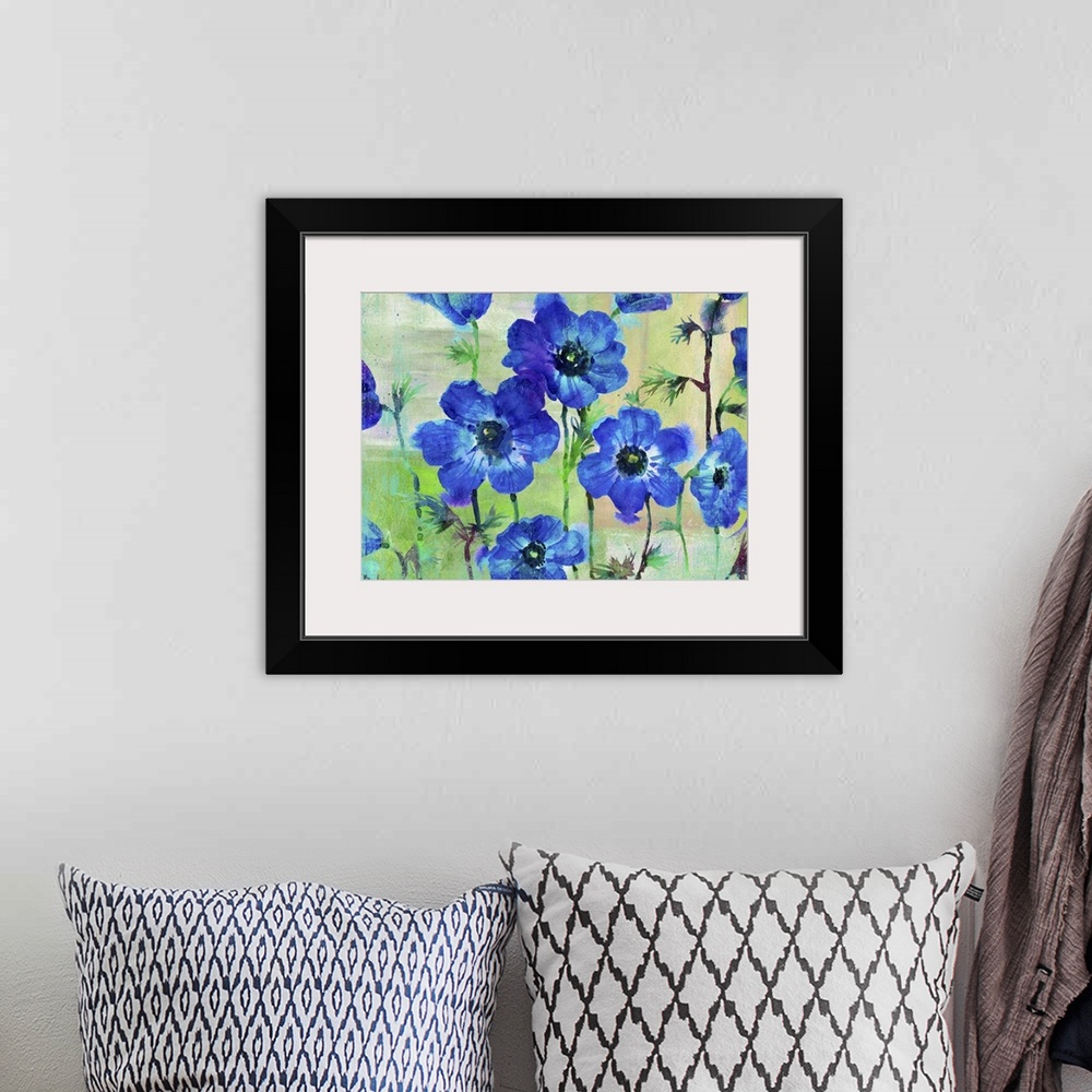 A bohemian room featuring Deep blue watercolor flowers.
