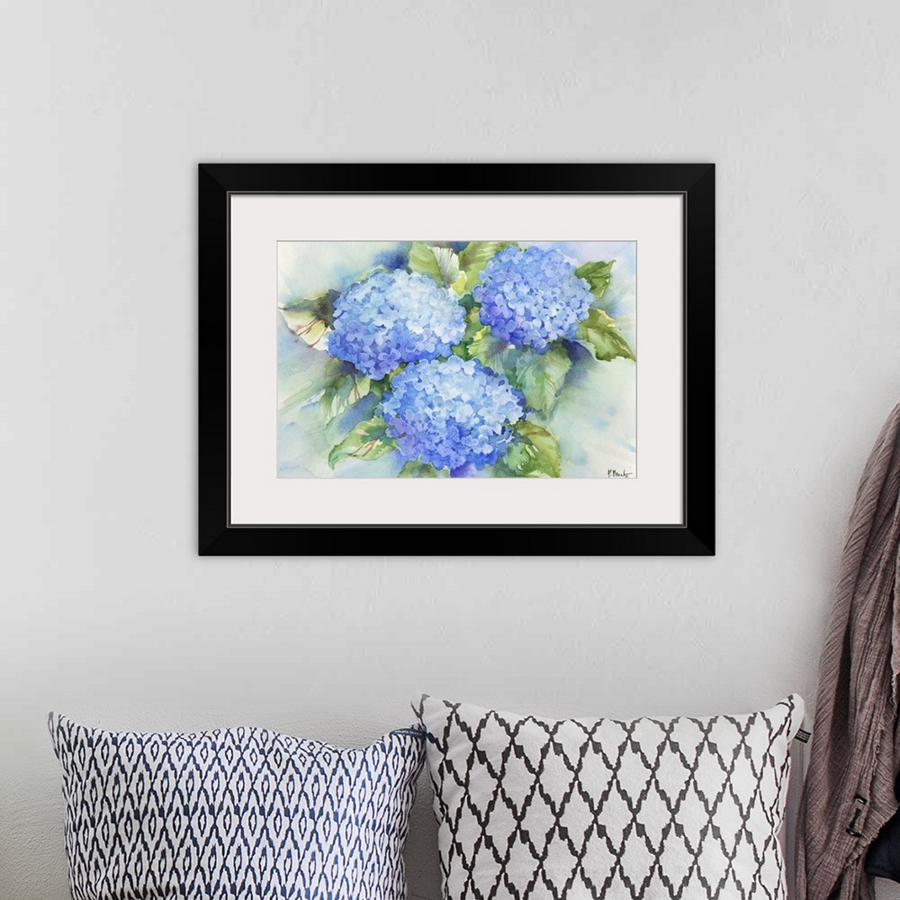 A bohemian room featuring Large watercolor painting of blue hydrangeas.