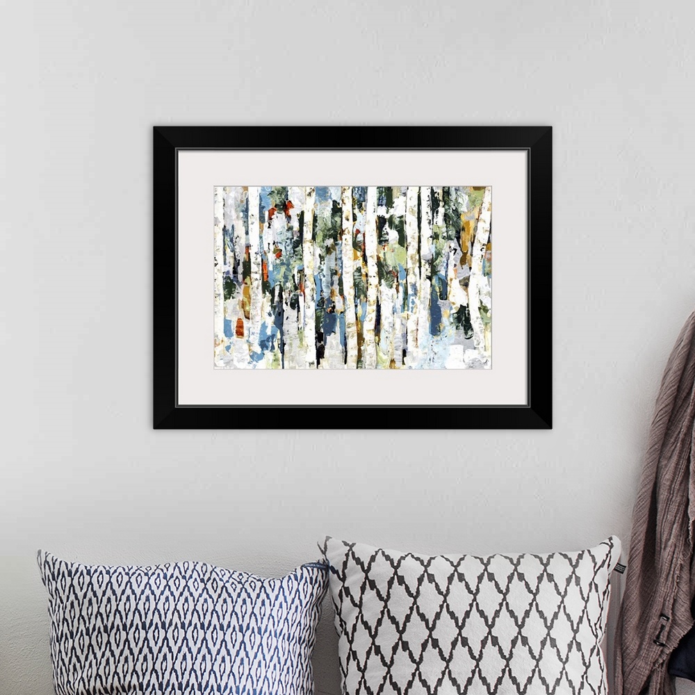 A bohemian room featuring Abstract painting of a wooded forest of colorful leaves.