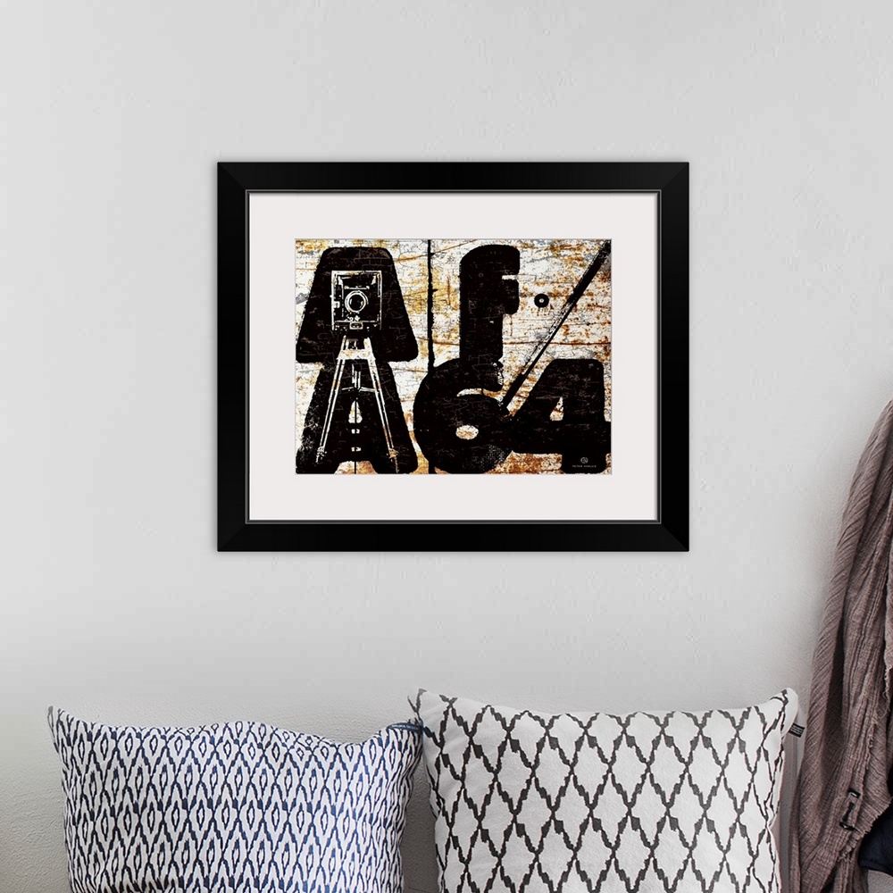 A bohemian room featuring f64 aperture chunky and bold typography with an illustrated 8x10 camera in the letters AA which s...