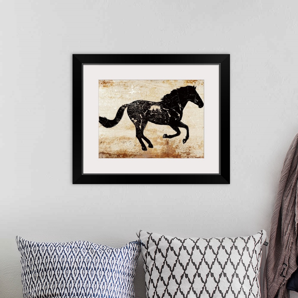A bohemian room featuring Galloping black horse profile on a textured rust background.