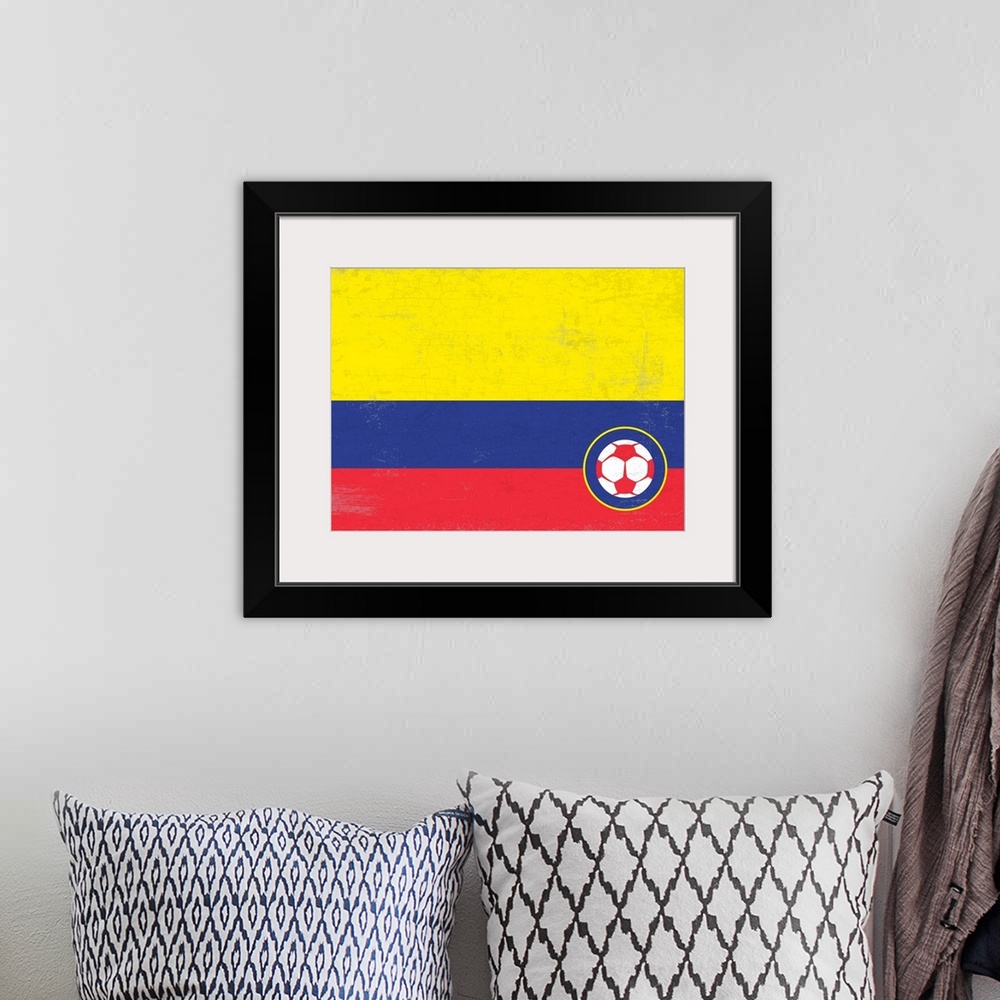 A bohemian room featuring Flag of Columbia with soccer crest with soccer ball.
