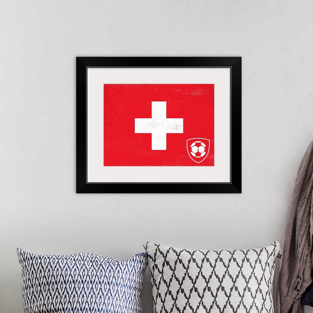 A bohemian room featuring Flag of Switzerland with soccer crest with soccer ball.