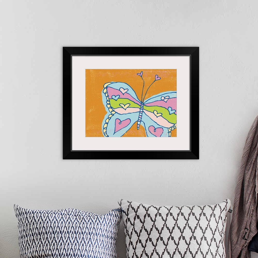 A bohemian room featuring A pen and ink illustrated butterfly with hearts on an orange background.