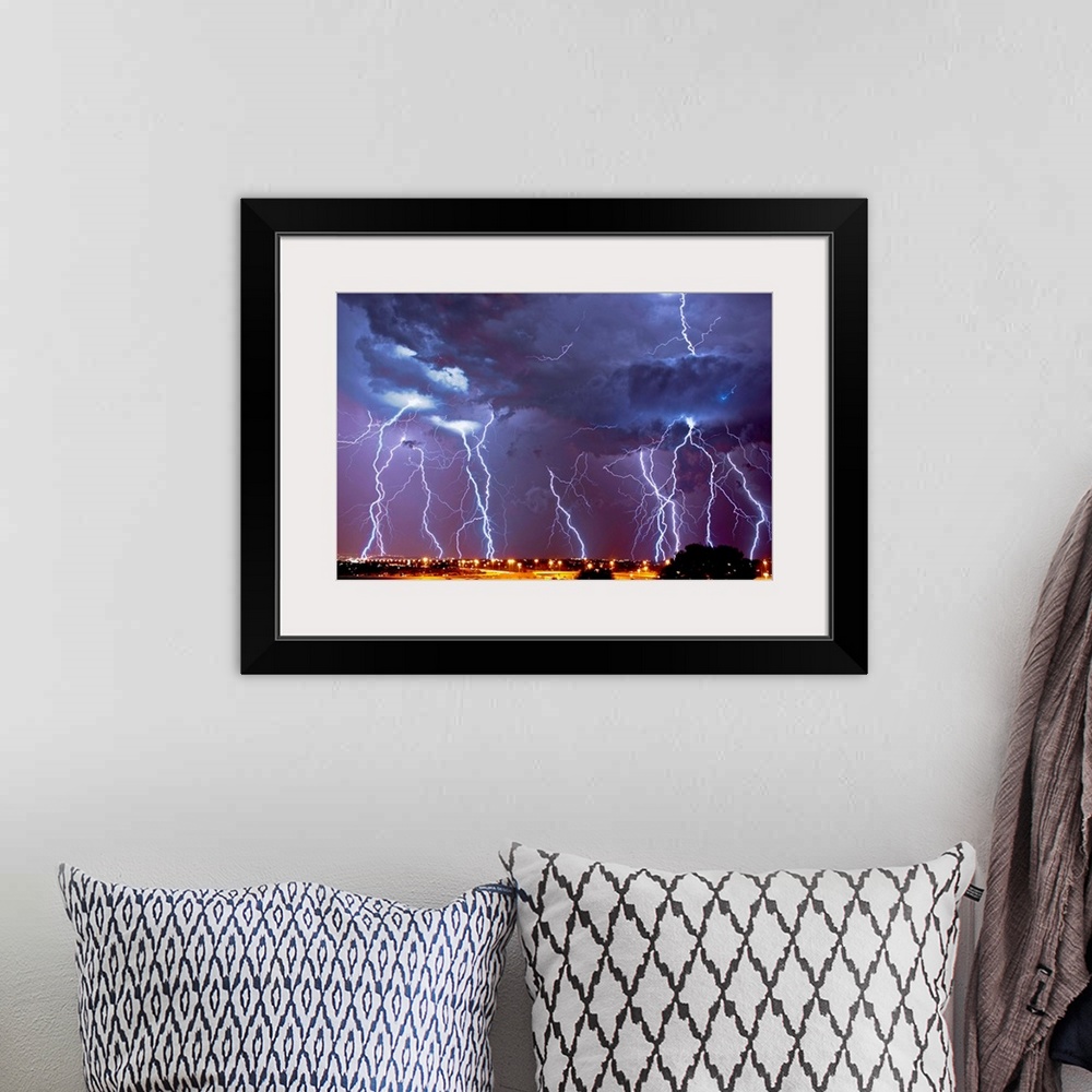 A bohemian room featuring Multiple exposures of a lightning storm over South Africa.
