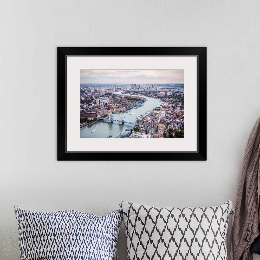 A bohemian room featuring Aerial view of River Thames and Tower Bridge in London, England.