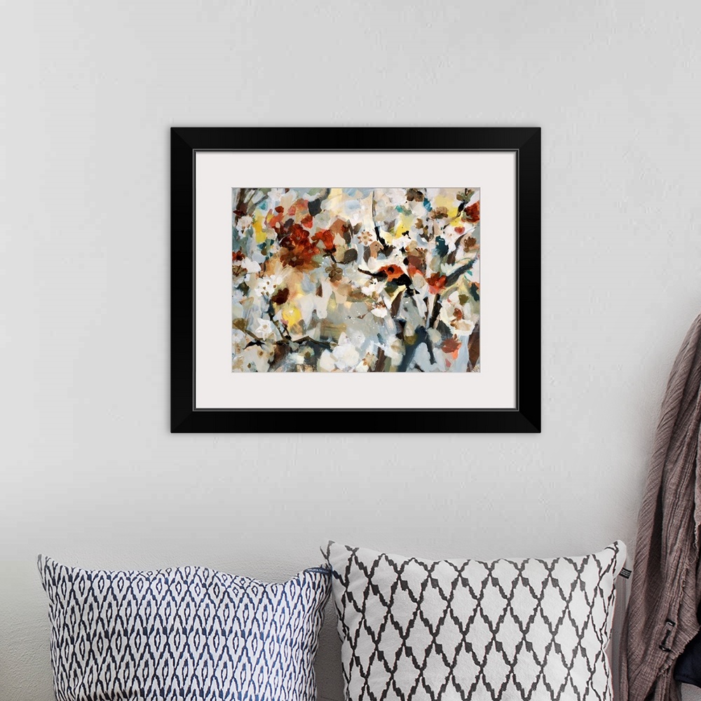 A bohemian room featuring Abstract painting of various types of flowers that are bunched together and uses soft colors.