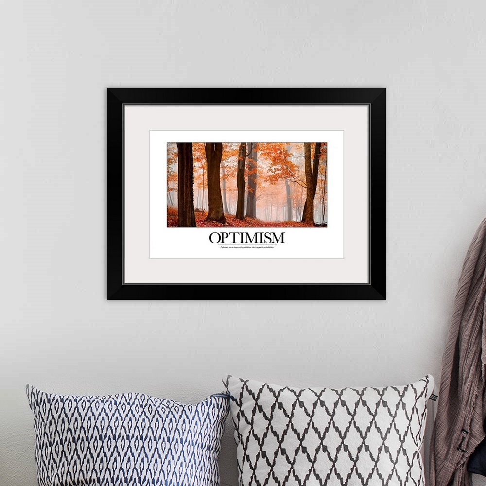 A bohemian room featuring Motivational poster featuring a misty forest in autumn and the text, "Optimism: Optimism turns dr...