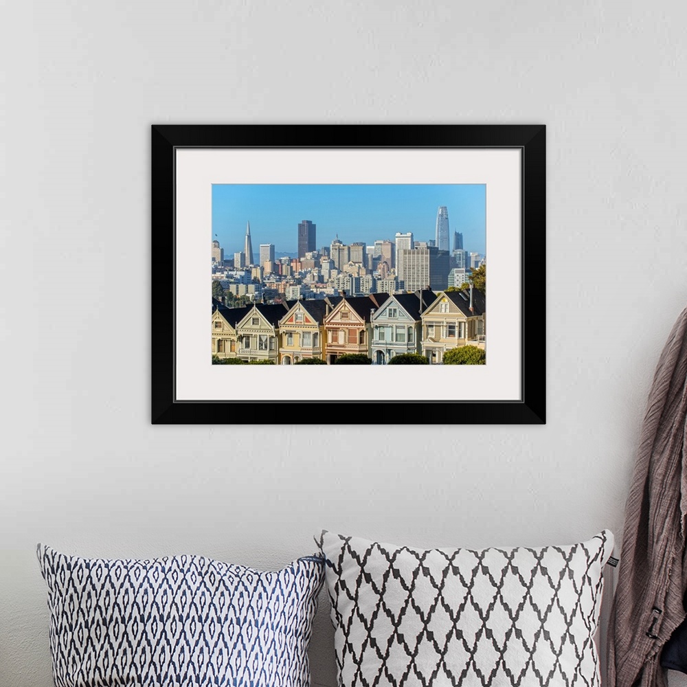 A bohemian room featuring Photograph of the Painted Ladies in downtown San Francisco with tall buildings in the background.
