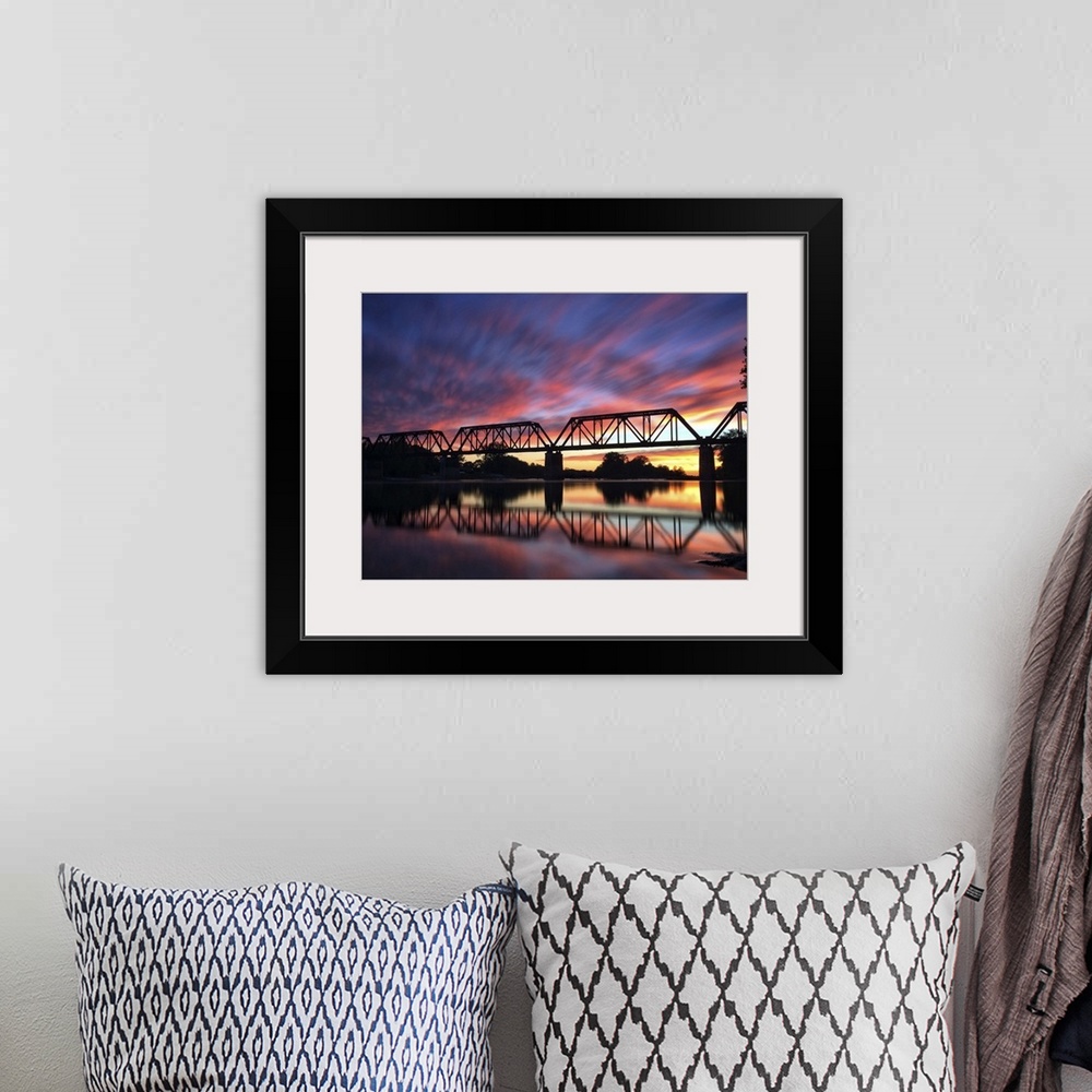 A bohemian room featuring Photograph of a bridge silhouette at sunset in Providence Metropark.