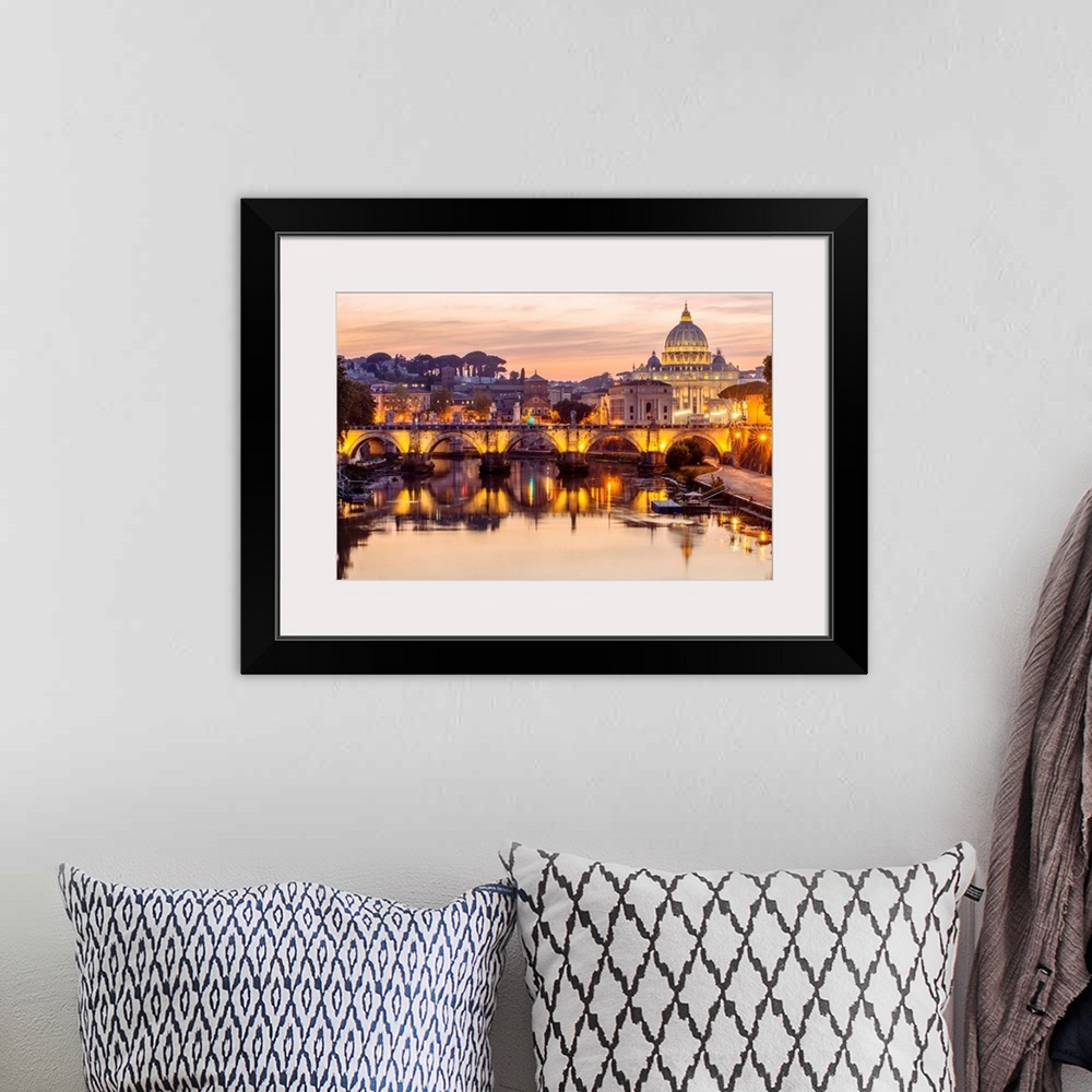 A bohemian room featuring A view of St. Peter's Basilica in the Vatican and the Ponte Sant'Angelo  spanning across the rive...