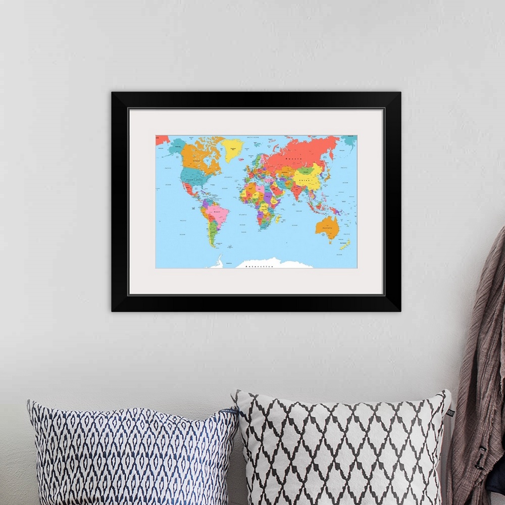 A bohemian room featuring Large color map of the World with a modern font.