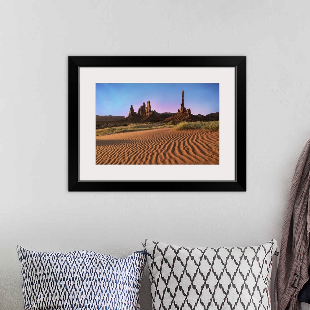 A bohemian room featuring Sunrise at Totem Pole and Y'ei Bi Chei in Monument Valley, Arizona