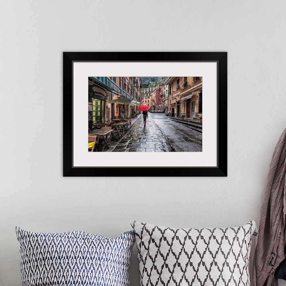 A bohemian room featuring Woman with red umbrella in the rain in Vernazza, Italy