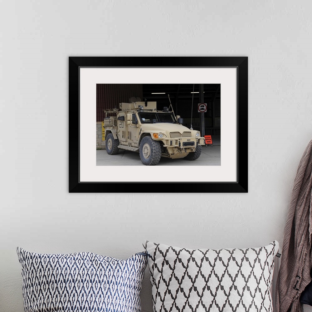 A bohemian room featuring A Husky TSV armored vehicle of the British Army.