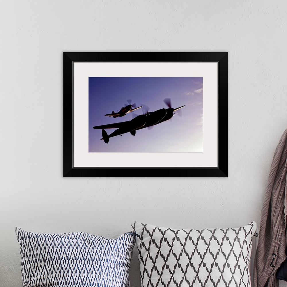A bohemian room featuring A P-38 Lightning and P-51D Mustang in flight over Chino, California.