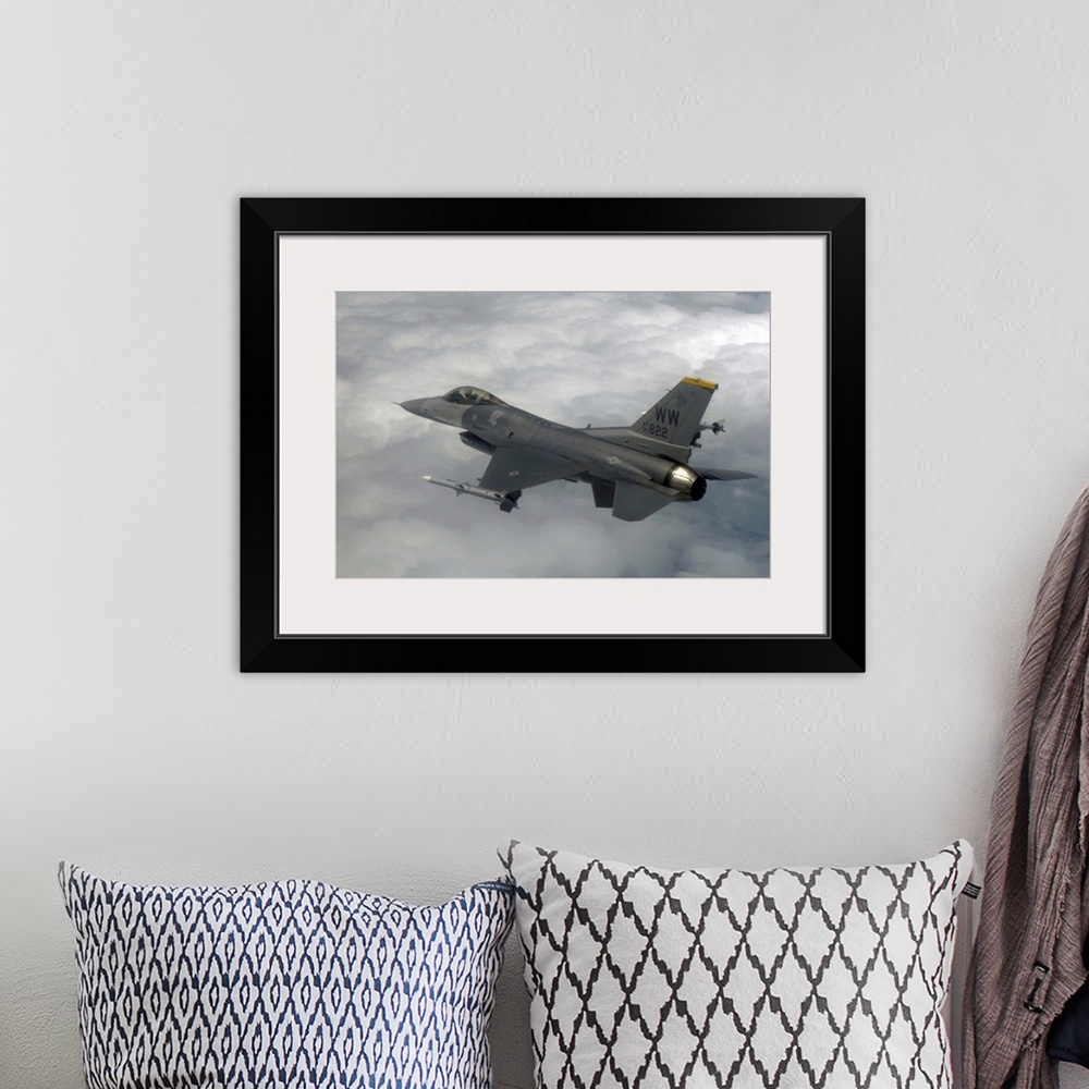 A bohemian room featuring An F16 Fighting Falcon in flight