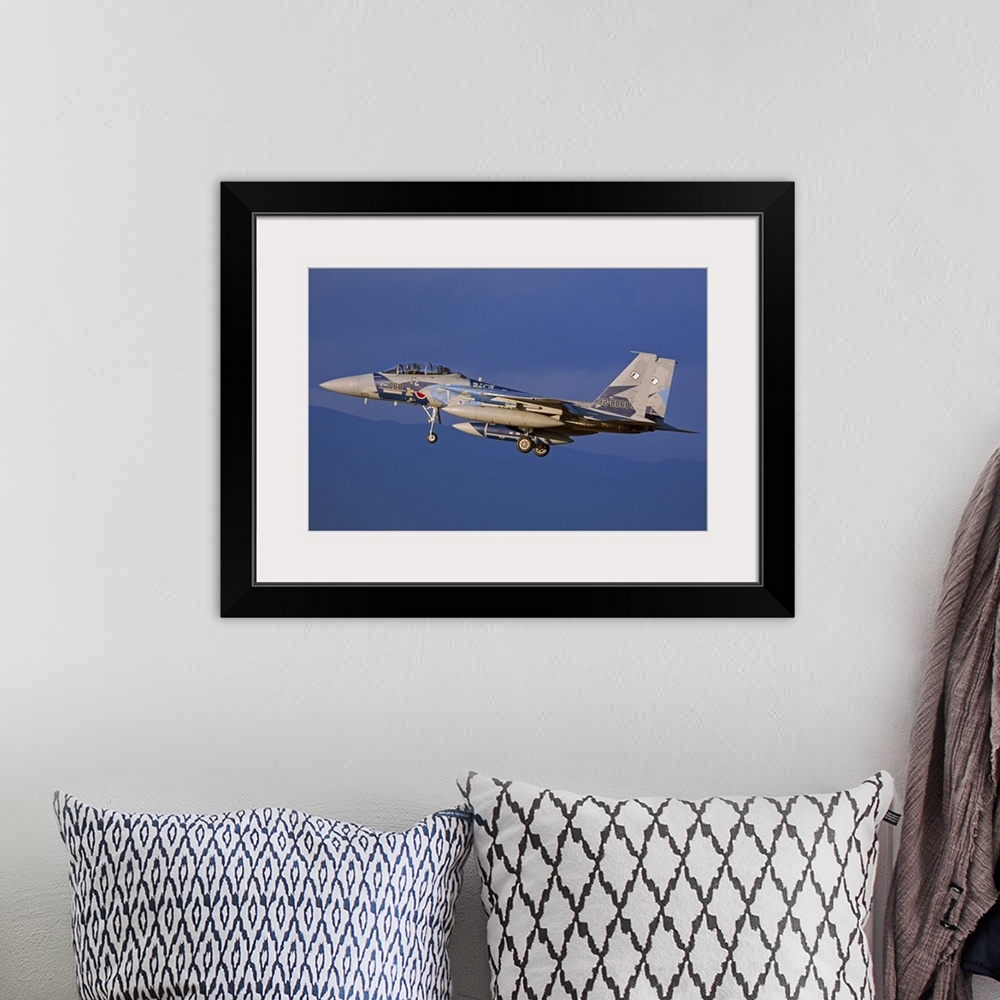 A bohemian room featuring F-15DJ Eagle of the Japan Air Self Defense Force's Hiko Kyodatai aggressor squadron flying over J...