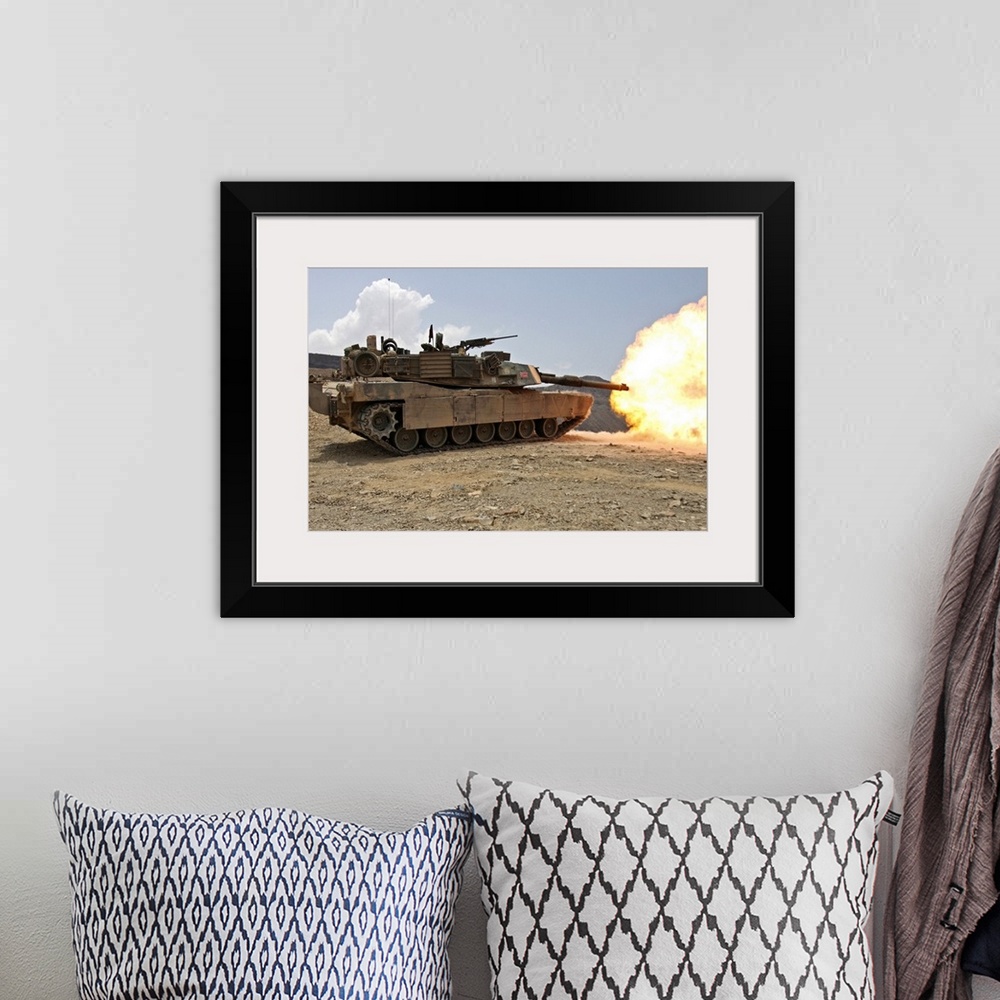 A bohemian room featuring March 30, 2010 - Marines bombard through a live fire range using M1A1 Abrams tanks alongside the ...