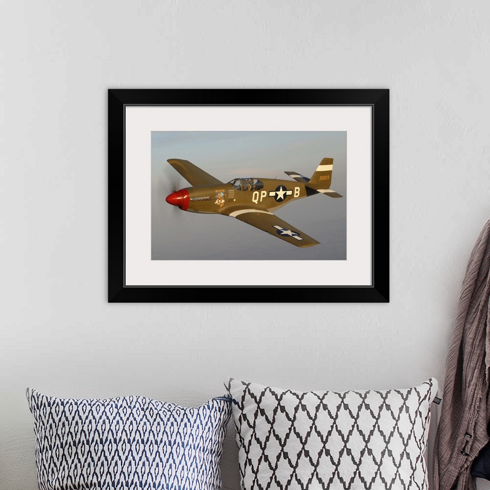 A bohemian room featuring P-51C Mustang flying over Chino, California.