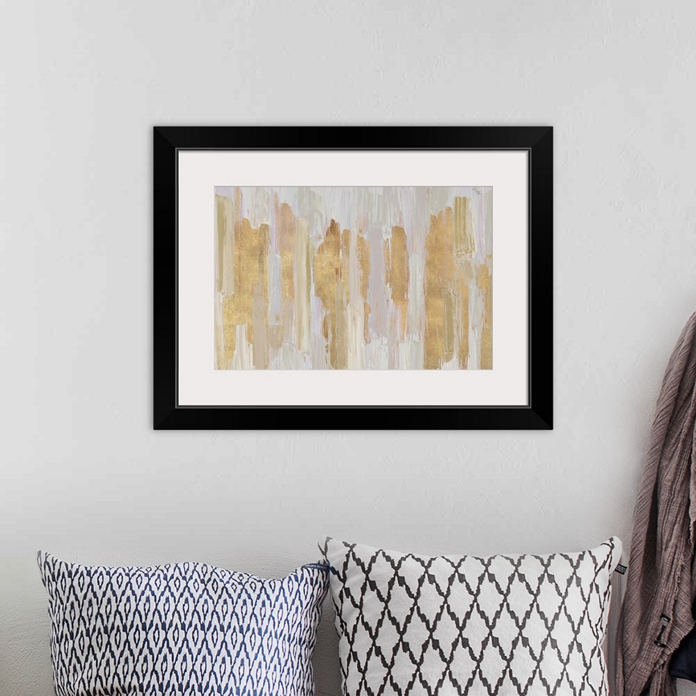 A bohemian room featuring Contemporary abstract painting in golden shades.