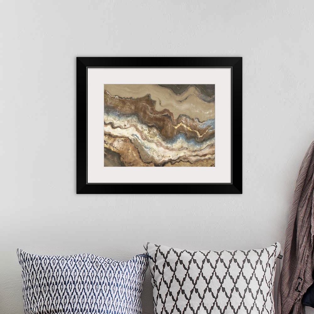 A bohemian room featuring Contemporary abstract artwork resembling sedimentary rock layers.