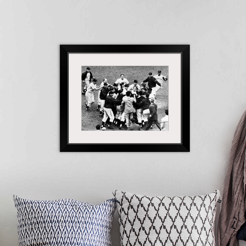 A bohemian room featuring Bobby Thomson of the New York Giants being mobbed by teammates and fans after hitting his pennant...