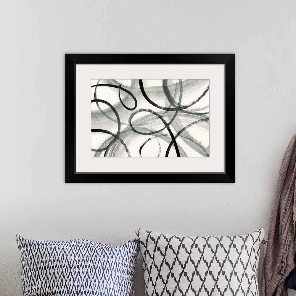A bohemian room featuring Black and white abstract painting with loop black lines on a faded background.