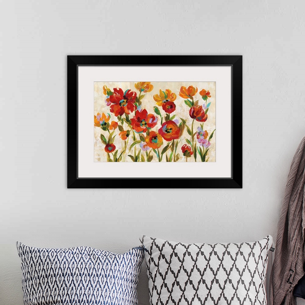 A bohemian room featuring Rectangular contemporary painting of colorful red and orange flowers on a beige and cream colored...