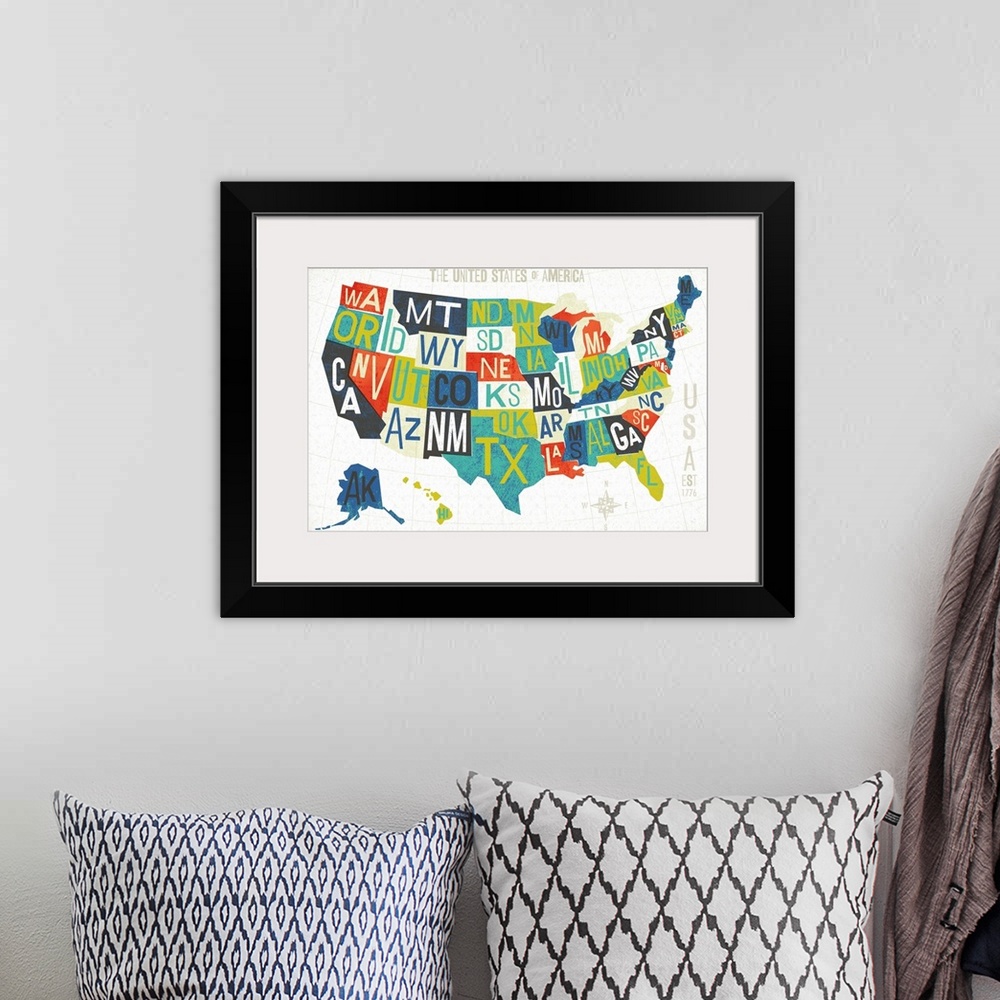A bohemian room featuring Map of the United States of America with the abbreviation of each state.