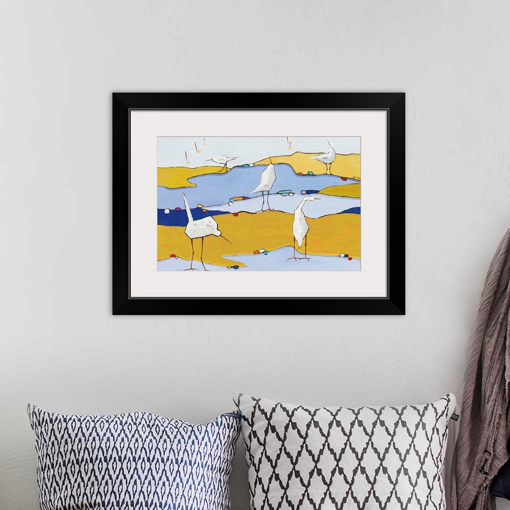 A bohemian room featuring Abstract painting of five white egrets in a marsh made out of a variety of blue and yellow hues.