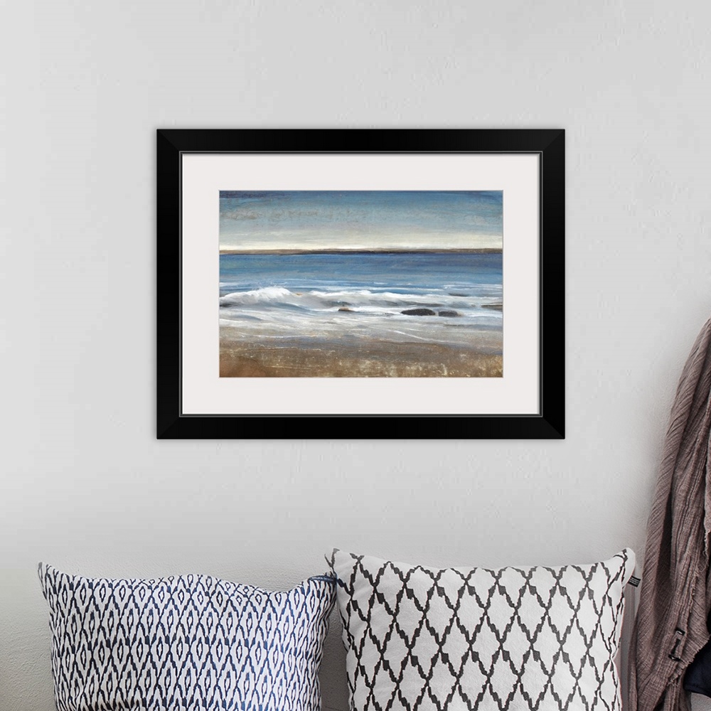 A bohemian room featuring Contemporary painting of a seascape with small waves.