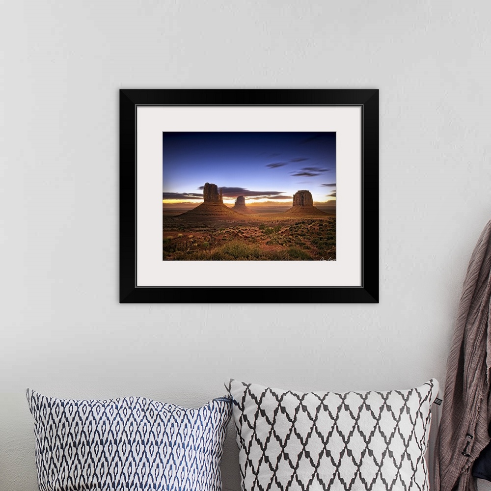 A bohemian room featuring Beautiful photograph of the canyons in Monument Valley, AZ at sunset.