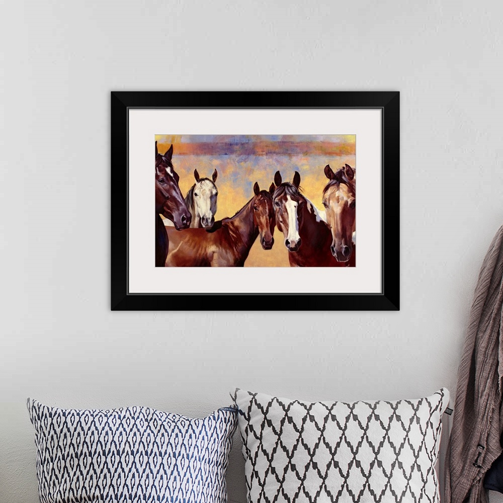 A bohemian room featuring Contemporary artwork of horses that are all standing together and looking straight at you. The ba...