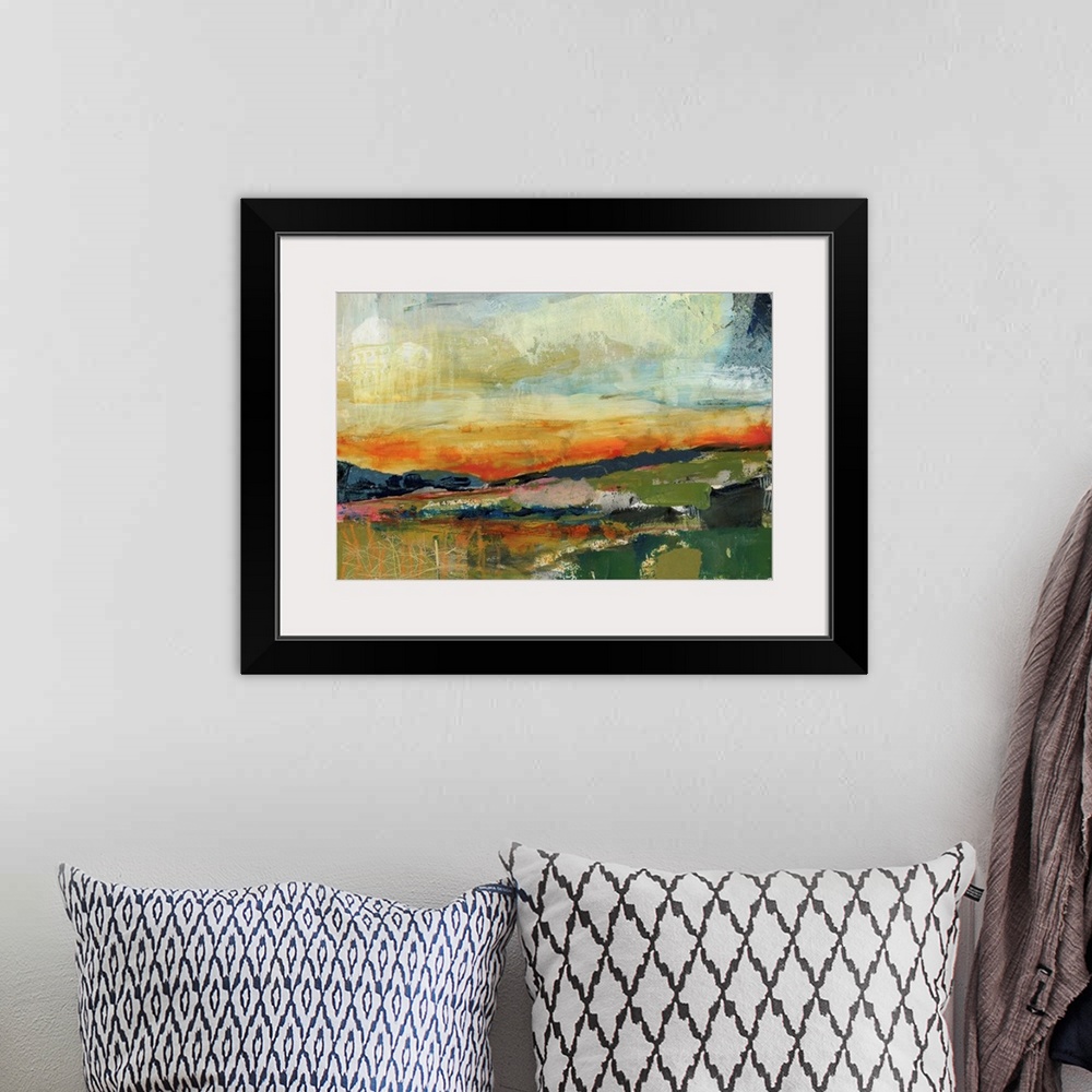 A bohemian room featuring A bright, contemporary abstract painting resembling a landscape at sunset