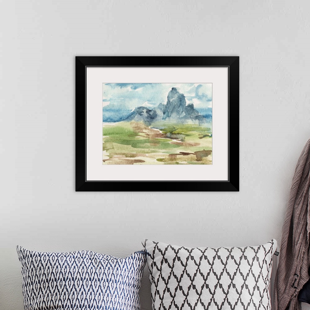 A bohemian room featuring Contemporary watercolor landscape of a field and a mountain in the distance.