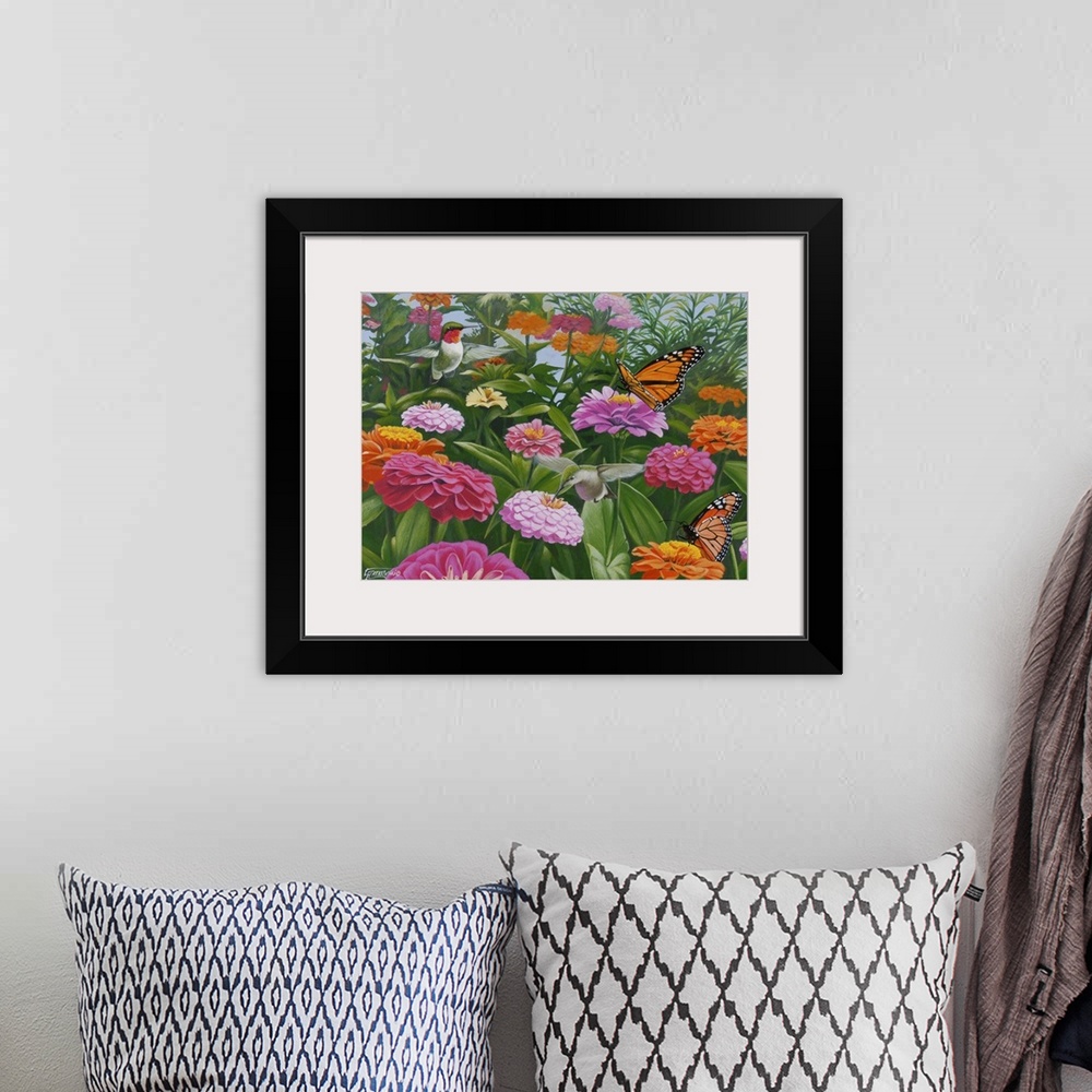 A bohemian room featuring Contemporary painting of a monarch butterfly and a humming bird in a field of zinnia flowers.