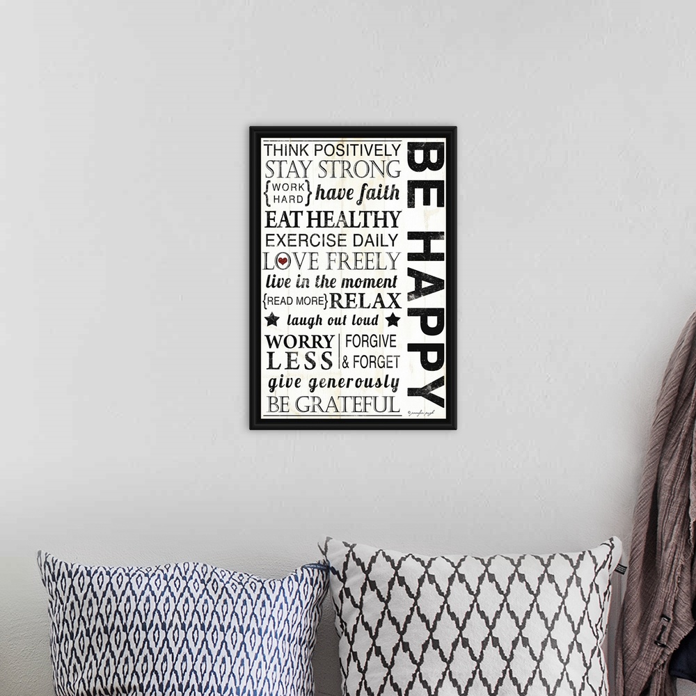 A bohemian room featuring Large inspirational art composed of motivational text filling the entire area that tells somebody...