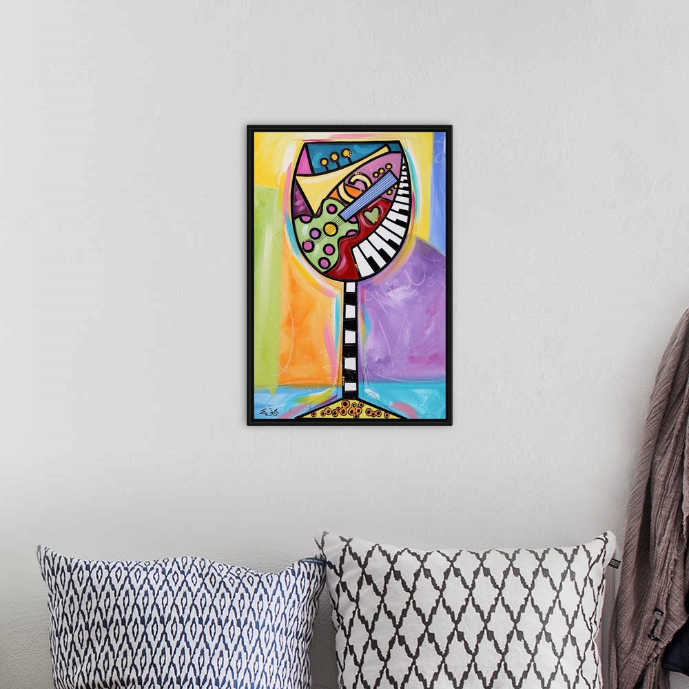 A bohemian room featuring Giant, vertical contemporary painting of a large wine glass full of colorful shapes and musical i...